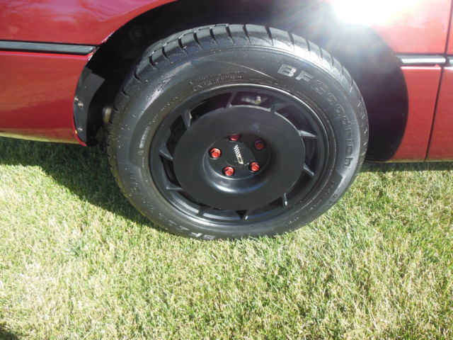 1986 maroon Chevrolet Corvette Coupe