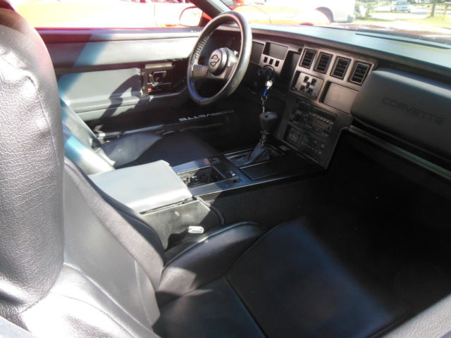 1986 maroon Chevrolet Corvette Coupe