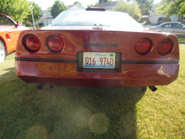 1986 maroon Chevrolet Corvette Coupe