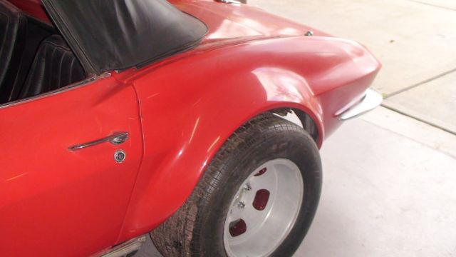 1966 red Chevrolet Corvette Convertible