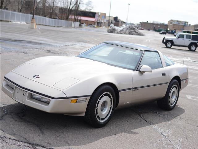1987 Gold Chevrolet Corvette --