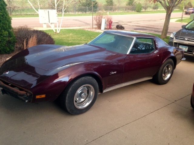 1973 maroon Chevrolet Corvette Coupe