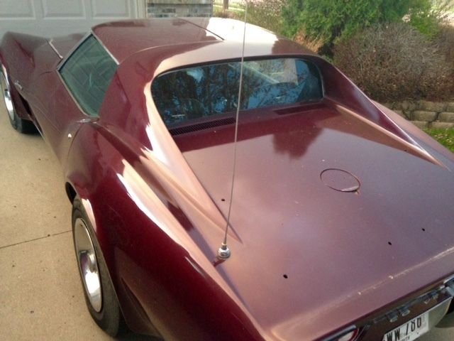 1973 maroon Chevrolet Corvette Coupe