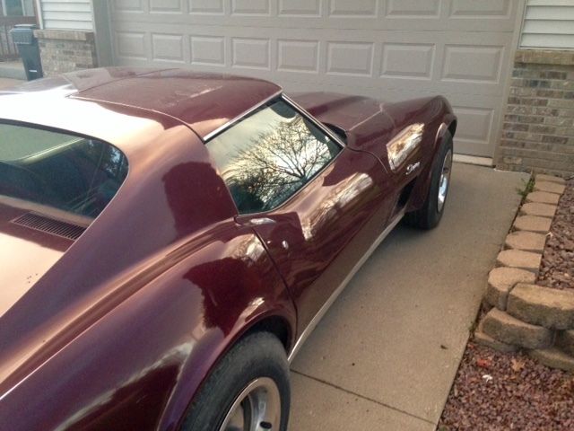 1973 maroon Chevrolet Corvette Coupe