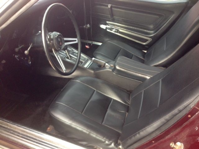 1973 maroon Chevrolet Corvette Coupe