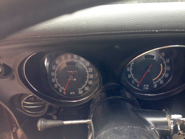 1973 maroon Chevrolet Corvette Coupe