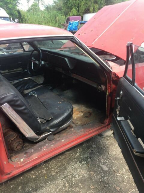 1966 white Chevrolet Impala Coupe