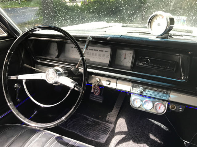 1966 white Chevrolet Impala Coupe