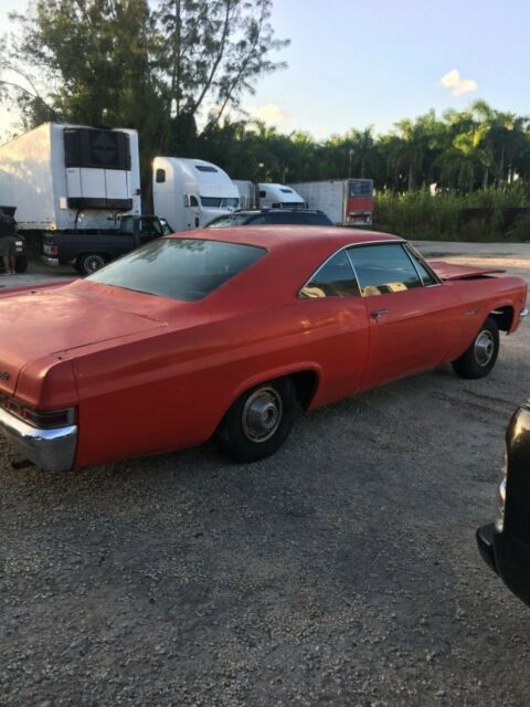 1966 white Chevrolet Impala Coupe