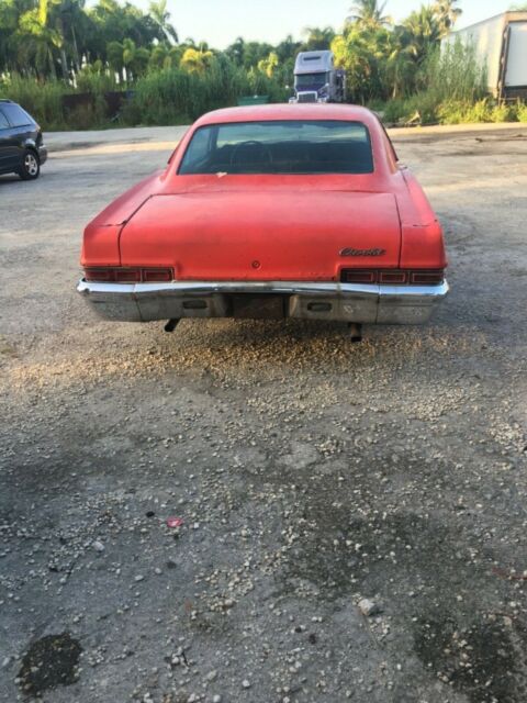 1966 white Chevrolet Impala Coupe