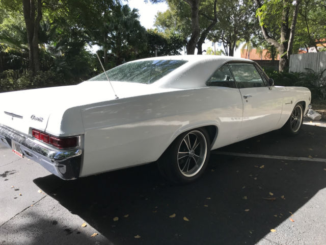 1966 white Chevrolet Impala Coupe