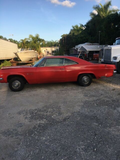 1966 white Chevrolet Impala Coupe