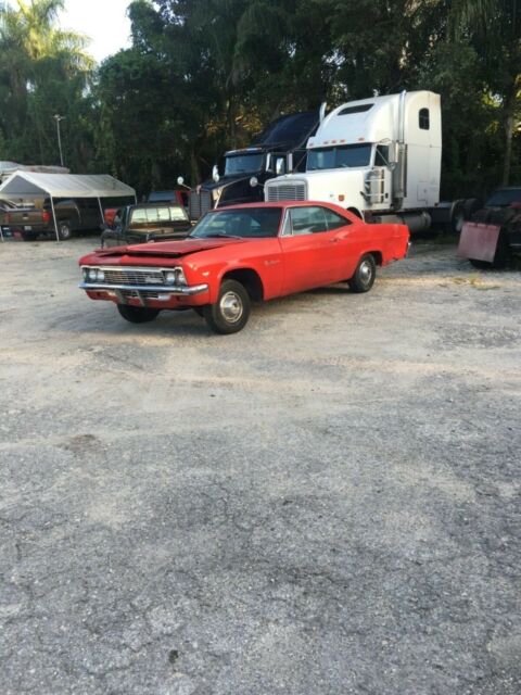 1966 white Chevrolet Impala Coupe