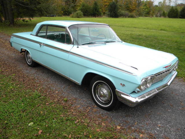 1964 Maroon Chevrolet Impala Coupe