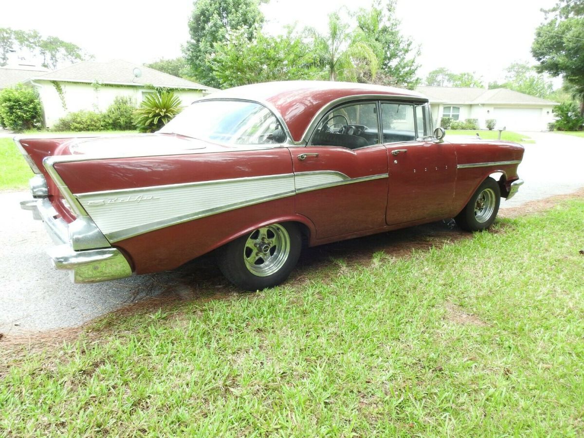 1957 Red Chevrolet Bel Air/150/210 Sedan