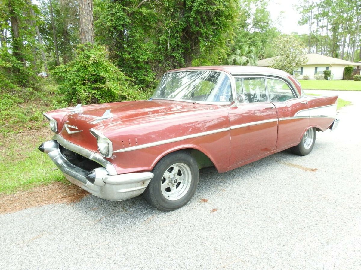 1957 Red Chevrolet Bel Air/150/210 Sedan