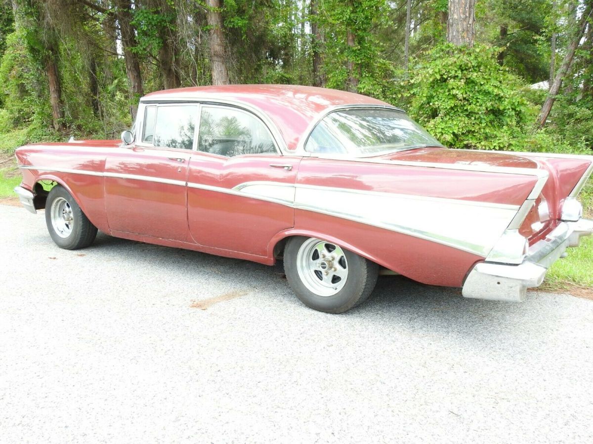 1957 Red Chevrolet Bel Air/150/210 Sedan