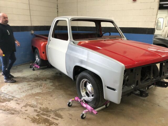 1976 Orange Chevrolet C-10 Stepside short bed