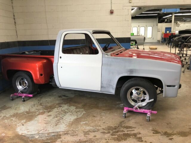 1976 Orange Chevrolet C-10 Stepside short bed