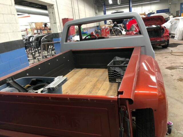 1976 Orange Chevrolet C-10 Stepside short bed