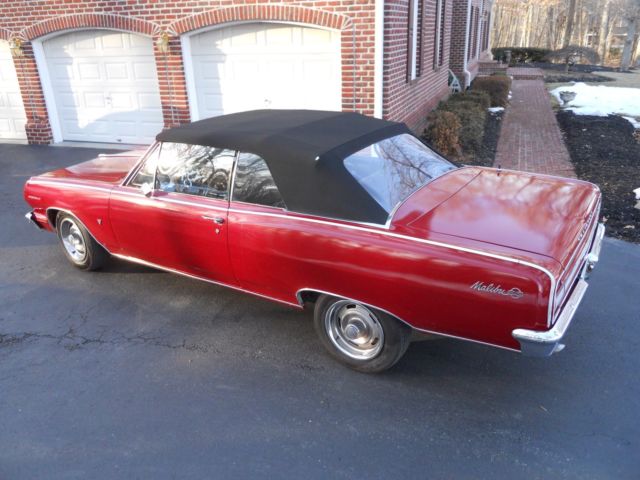 1964 red Chevrolet Chevelle convertible