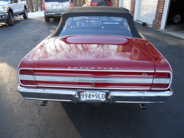 1964 red Chevrolet Chevelle convertible