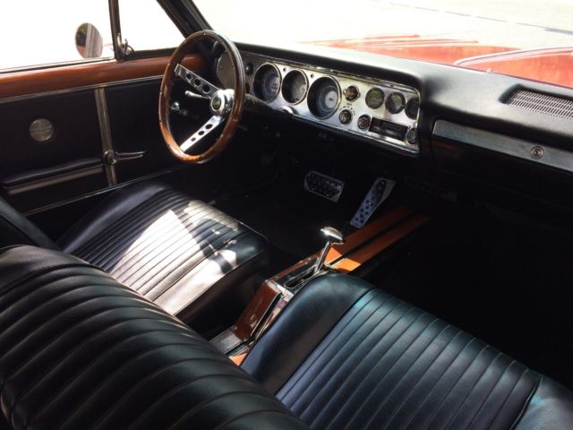 1964 red Chevrolet Chevelle convertible