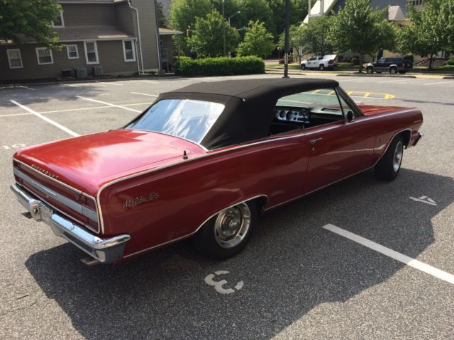 1964 red Chevrolet Chevelle convertible