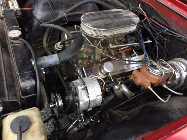 1964 red Chevrolet Chevelle convertible