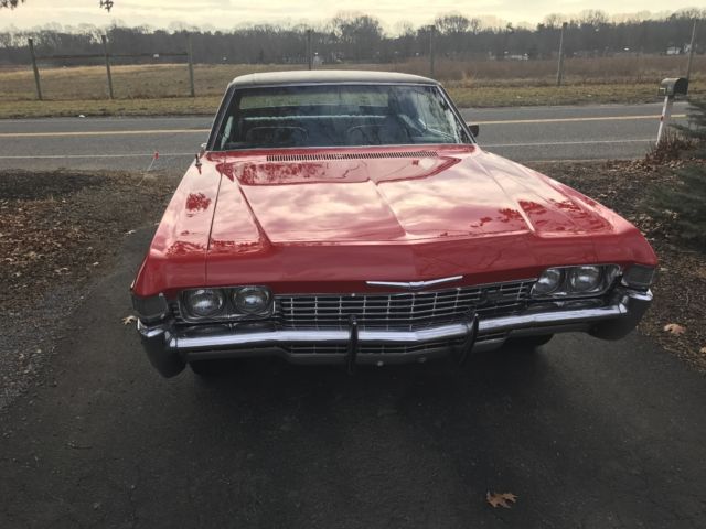 1968 Red Chevrolet Impala Coupe