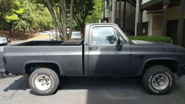 1984 flat black Chevrolet C/K Pickup 1500 Pickup Truck