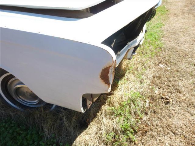1965 white Chrysler Imperial Coupe