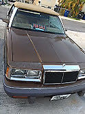 1986 Brown Chrysler LeBaron Convertible