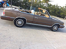 1986 Brown Chrysler LeBaron Convertible