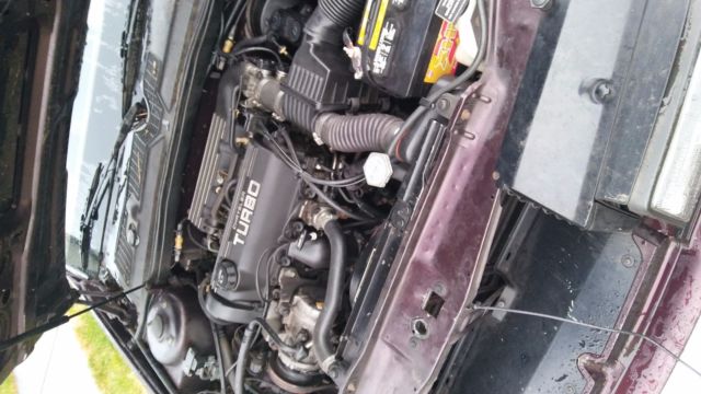 1989 maroon Chrysler Other convertible w/removable hardtop