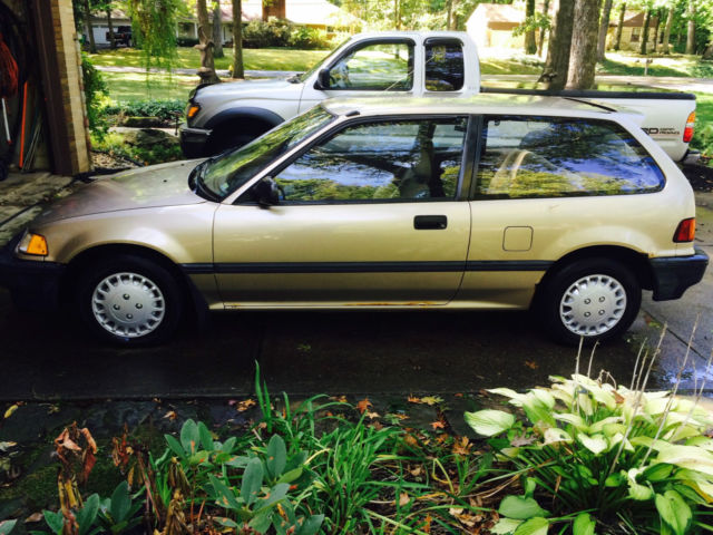 1988 gold Honda Civic Hatchback