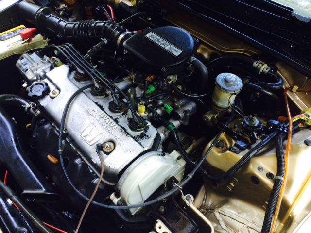 1988 gold Honda Civic Hatchback