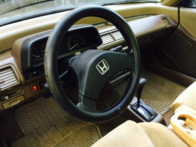 1988 gold Honda Civic Hatchback