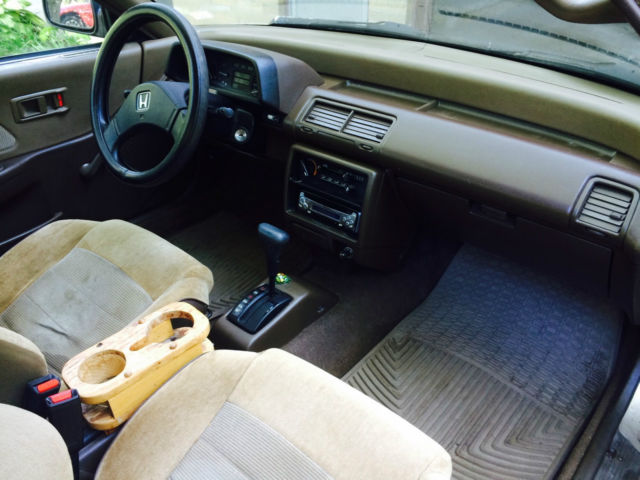 1988 gold Honda Civic Hatchback