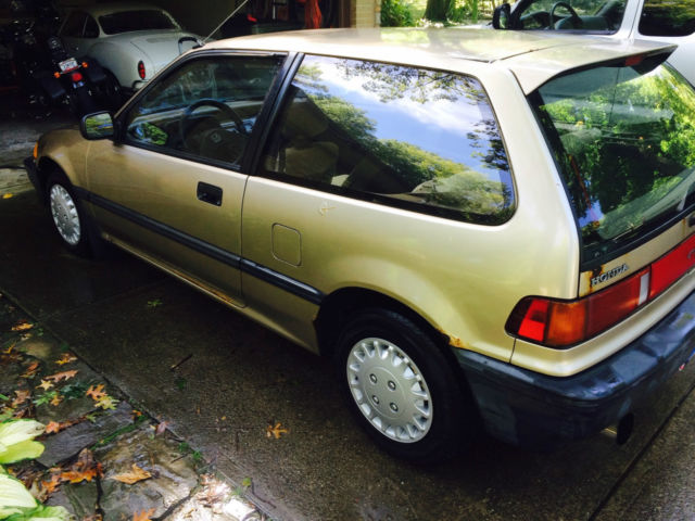 1988 gold Honda Civic Hatchback
