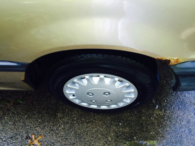 1988 gold Honda Civic Hatchback