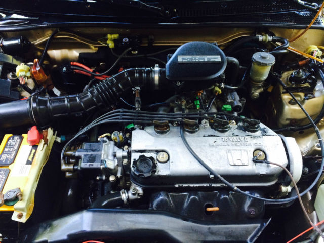 1988 gold Honda Civic Hatchback