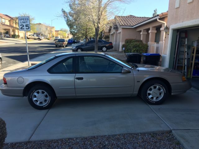 1994 Gold Ford Thunderbird Coupe