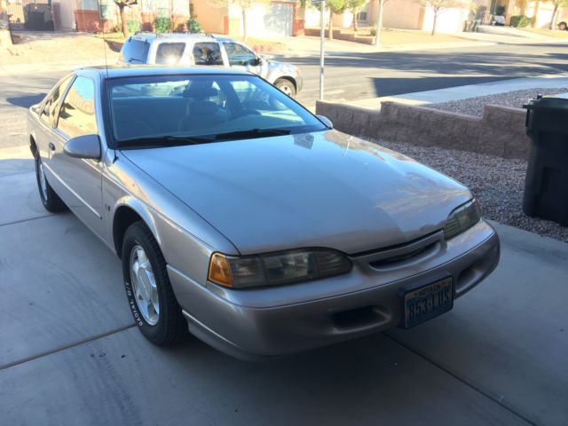 1994 Gold Ford Thunderbird Coupe