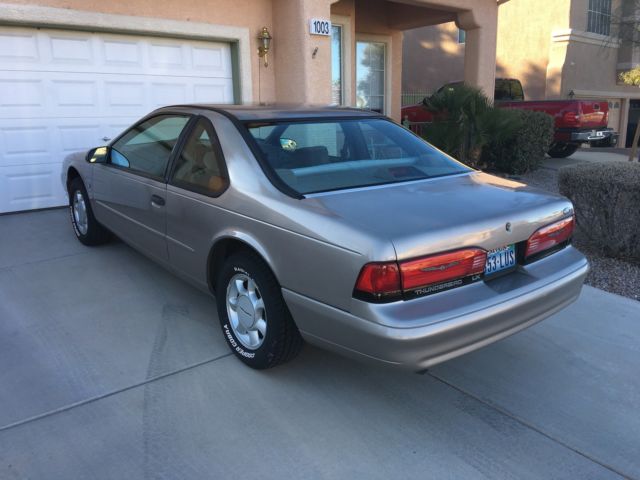 1994 Gold Ford Thunderbird Coupe