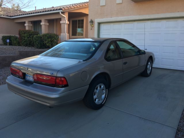 1994 Gold Ford Thunderbird Coupe