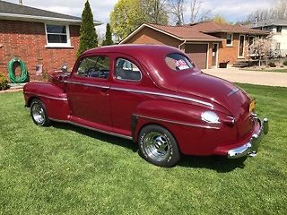 1947 Burgundy Ford Super Deluxe Coupe