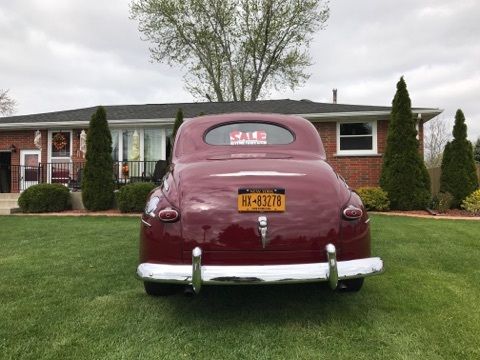 1947 Burgundy Ford Super Deluxe Coupe