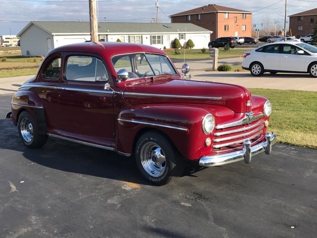 1947 Burgundy Ford Super Deluxe Coupe