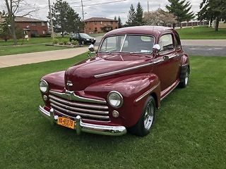 1947 Burgundy Ford Super Deluxe Coupe